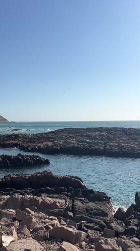 Coastal rocks filmed in clear weather in Arica, Chile