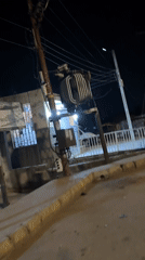 Nighttime street documentation captured across Bukuru, Nigeria residential area