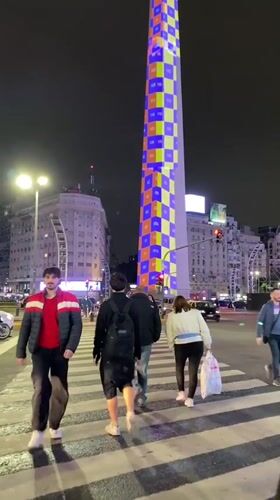 Buenos Aires Obelisco displays colorful light show during evening