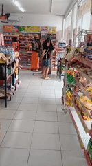 Inside an Alfamart store in Tengahan during a morning shift