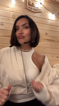 Woman poses for indoor portrait sessions in Sarapul