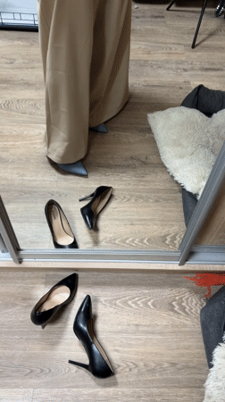 Woman tries on clothes in Saint Petersburg mirror