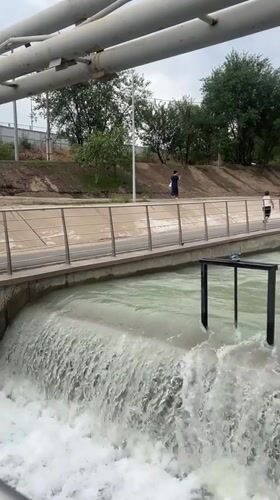Almaty neighborhood: rapids park, playgrounds, and city life