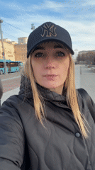 Couple photographs Lenin statue in Saint Petersburg square