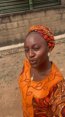 Woman photographed around residential Barakin Akawo, Nigeria neighborhood