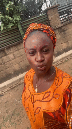 Woman photographed around residential Barakin Akawo, Nigeria neighborhood