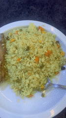 Meal of yellow rice and vegetables documented in Enugu