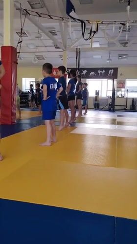 Kids' judo training session on the mats in Chaikovsky