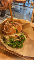 Skewered burger served on wooden stick in Đà Nẵng