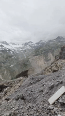 Rocky slopes and snow-capped peaks near Terskol, Caucasus