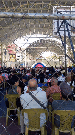Large outdoor gathering draws hundreds in Caracas