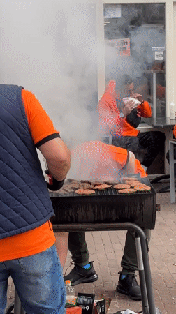 King's Day celebrations draw orange-clad crowds to Amsterdam streets