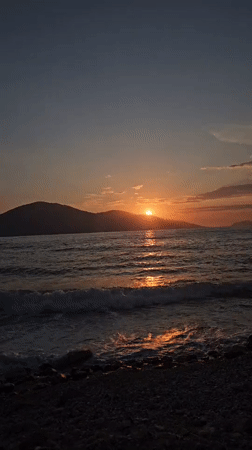 Sunset recorded over calm waters at Albanian beach