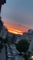 Urban sunset documented by witnesses from multiple vantage points