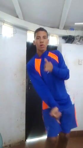Group in matching shirts films selfies, dances in Porlamar