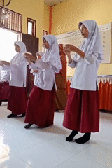 Students perform synchronized dance in Indonesian classroom