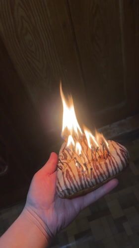 Heart-shaped pastry with lit matches observed in Lozarevo, Bulgaria