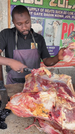 Daily life unfolds on Jos streets during afternoon hours