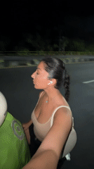 Woman on motorcycle observed at night in Kuta Selatan