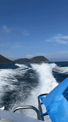 Boat passenger captures wake view near Nha Trang islands