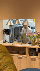 Chef prepares pizza in Moscow restaurant kitchen
