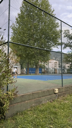 Tennis player spotted on outdoor court in Tivat