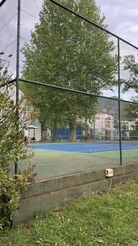 Tennis player spotted on outdoor court in Tivat