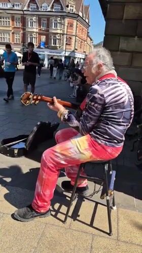 Cambridge street scenes: busker, cosmetics, casual dining captured