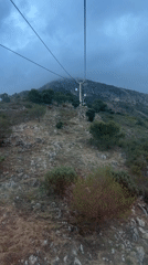 Cable car passengers document scenic ride in Benalmádena, Spain