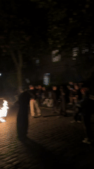 Evening gatherings and street scenes documented in central Berlin