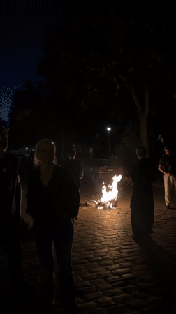 Evening gatherings and street scenes documented in central Berlin