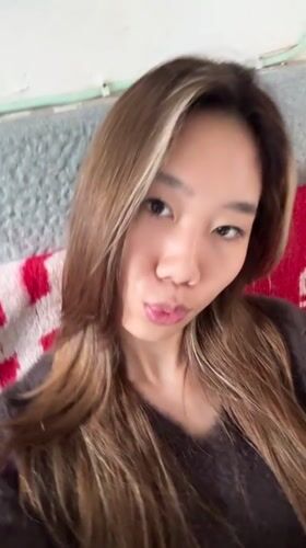 Woman records casual selfie videos in Hechuan early morning