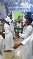 White-robed congregants gather for religious ceremony in Lokoja, Nigeria