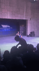 Roller skating pair dances on stage in Kemer, Turkey