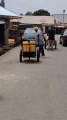 Street vendors conduct daily business in Jos, Kabong Nigeria
