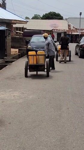 Street vendors conduct daily business in Jos, Kabong Nigeria