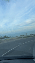 Car travels coastal road in Nesebar, Bulgaria