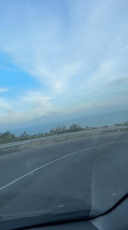 Car travels coastal road in Nesebar, Bulgaria
