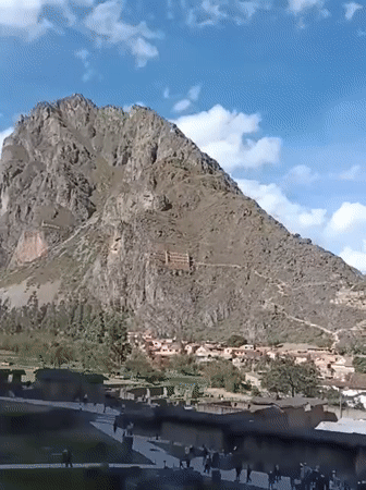 Tourists explore ancient Ollantaytambo ruins in Peru's Sacred Valley