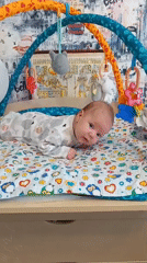 Domestic scenes: infant playtime and indoor selfie captured
