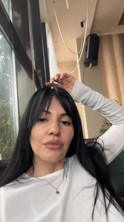 Woman enjoys leisurely afternoon at upscale Sochi café