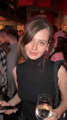 Women socialize at neon-lit nightclub in Krasnoyarsk
