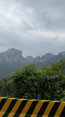 Morning drive through misty mountains in Zhonghu, China