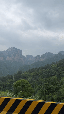 Morning drive through misty mountains in Zhonghu, China