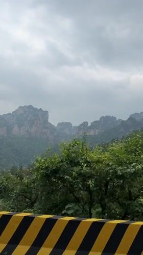 Morning drive through misty mountains in Zhonghu, China