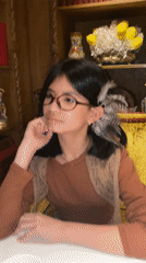 Young girl dines at Yekaterinburg restaurant with tea service