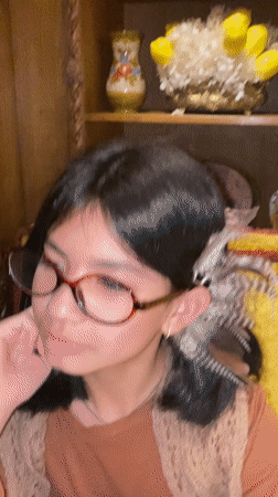 Young girl dines at Yekaterinburg restaurant with tea service