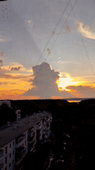 Sunset gathering along Kama River embankment in Chaikovsky