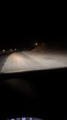 Night driving through snow-covered roads captured near Jdour, Morocco