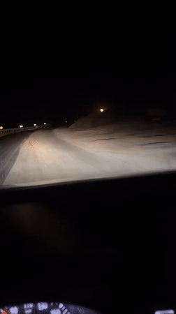 Night driving through snow-covered roads captured near Jdour, Morocco